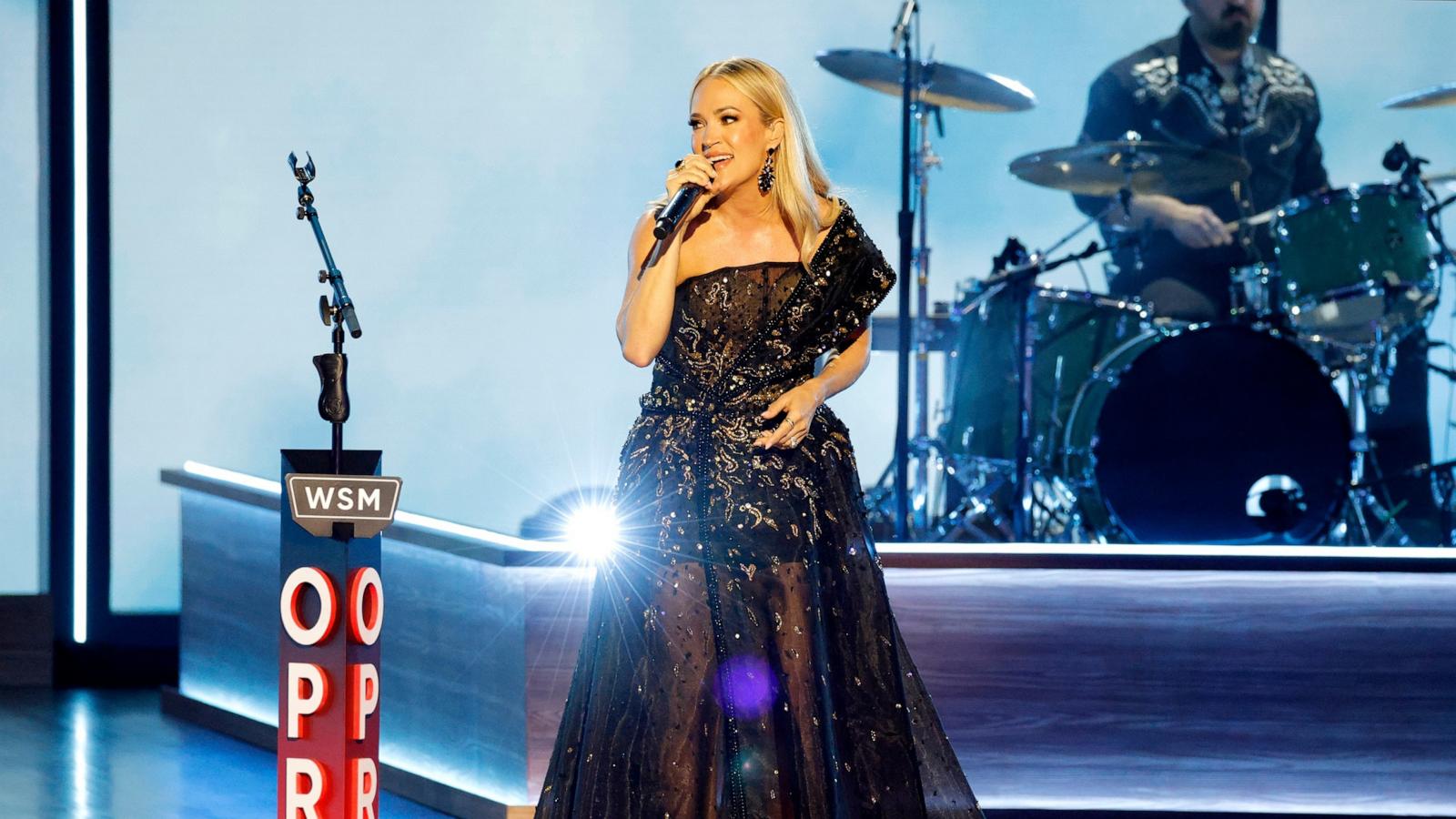 PHOTO: Carrie Underwood performs onstage during Opry 100: A Live Celebration at Grand Ole Opry at the Ryman Auditorium on March 19, 2025 in Nashville, Tennessee.