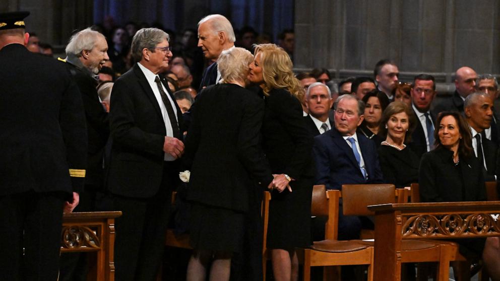 PHOTO: Members of the Carter family, including Jeff and Jack Carter, greet President Joe Biden as they arrive for state funeral services for former President Jimmy Carter at the National Cathedral, Jan. 9, 2025 in Washington, D.C.