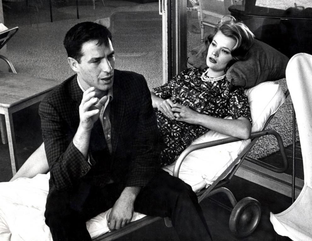 PHOTO: Actor John Cassavetes and actress Gena Rowlands talking at their house in 1964, at Los Angeles, California.