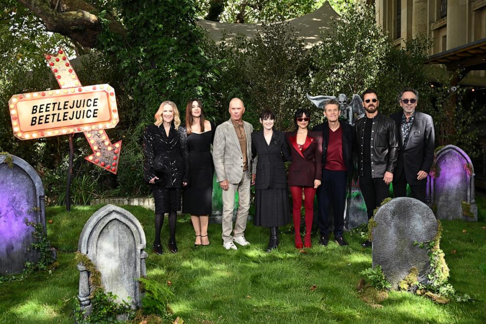 PHOTO: Catherine O'Hara, Monica Bellucci, Michael Keaton, Winona Ryder, Jenna Ortega, Willem Dafoe, Justin Theroux and Director Tim Burton attend the photocall for "Beetlejuice Beetlejuice" at One Marylebone on Aug. 30, 2024 in London.