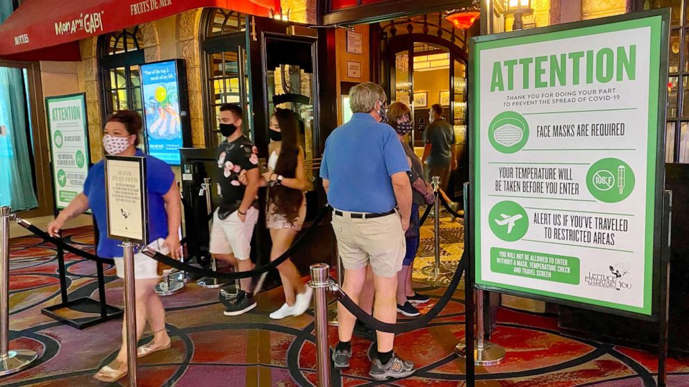 PHOTO: A sign displaying instructions to avoid the spread of Covid-19 is seen at the entrance of a casino restaurant in Las Vegas, Aug. 28, 2020. 