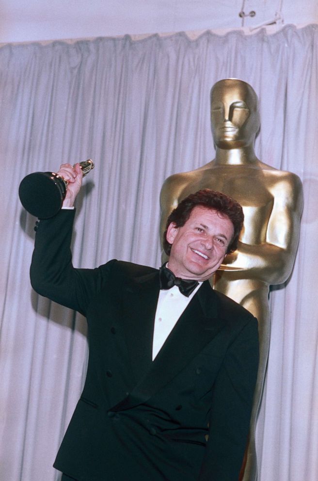 PHOTO: (Original Caption) Joe Pesci smiles as he holds his Oscar for Best Supporting Actor in the movie, Goodfellas backstage at the 63rd Academy Awards.