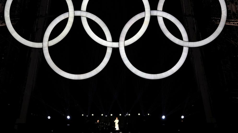 PHOTO: Celine Dion performs on the Eiffel Tower as the conclusion of the opening ceremony of the Olympic Games Paris 2024, July 26, 2024, in Paris.