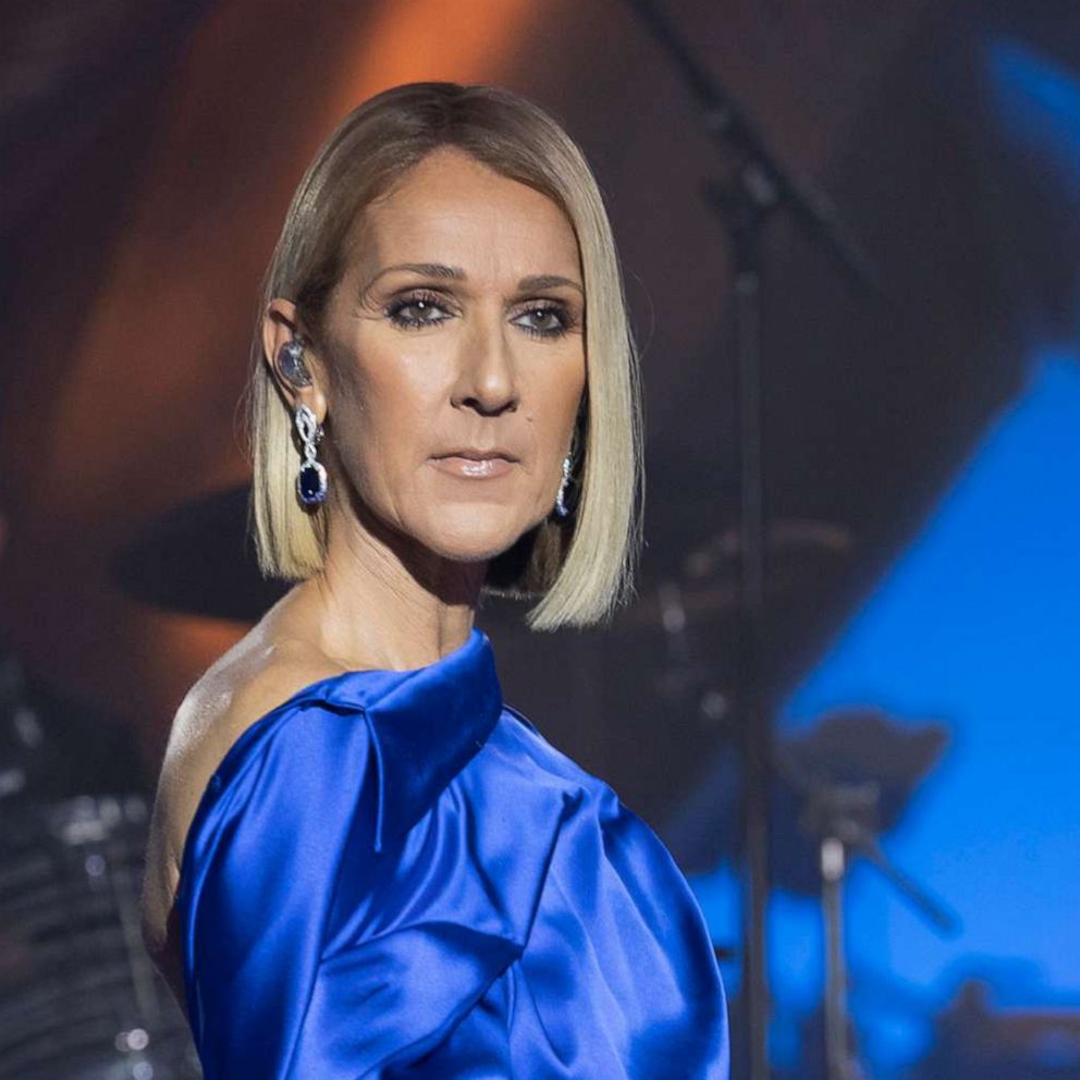 celine dion blue dress Cline Dion Weighs In On Titanic's Greatest Controversy