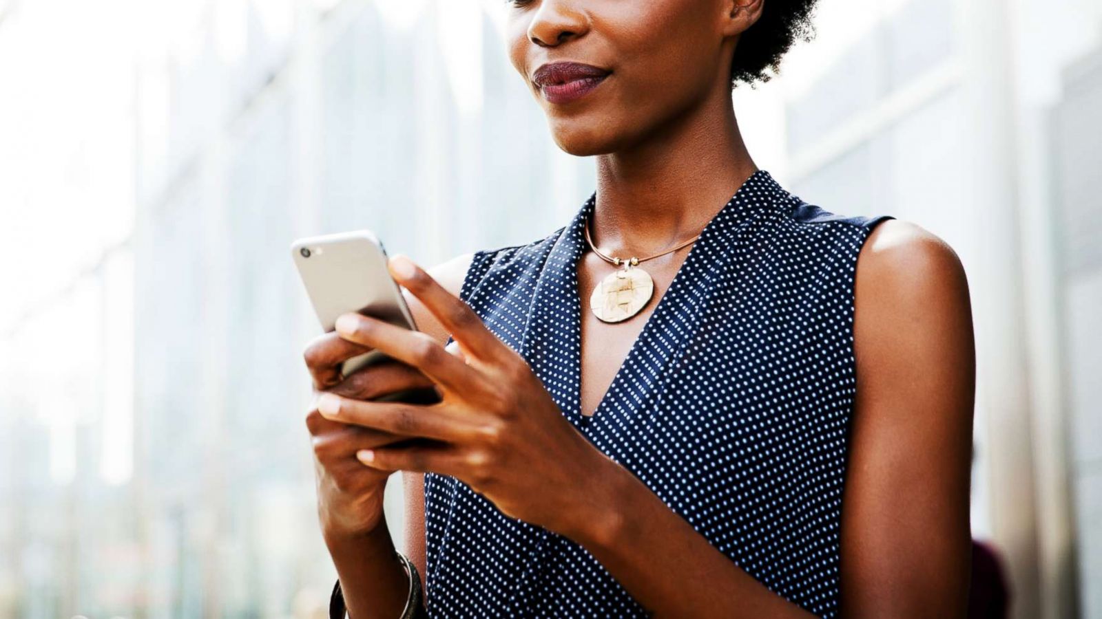 PHOTO: A woman uses a cellphone in this stock photo.