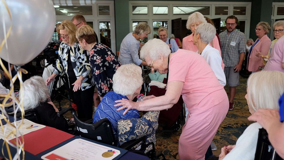 PHOTO: Well-wishers and honorees mingle at a celebration for six Nashville women who are all at least 100 years old at the Meadows Lakeshore Senior Living in Nashville, Aug. 15, 2019.