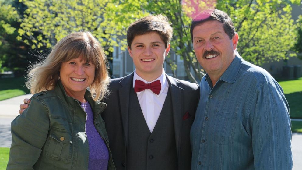 PHOTO: Nathan and Sylvia Harrell of Kansas City, Mo., pose with their son Chad before his high school prom.