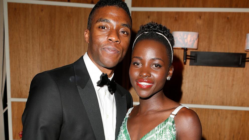 PHOTO: In this March 2, 2014 file photo, Lupita Nyong'o, right, and Chadwick Boseman attend the 2014 Vanity Fair Oscar Party Hosted By Graydon Carter in West Hollywood, Calif.