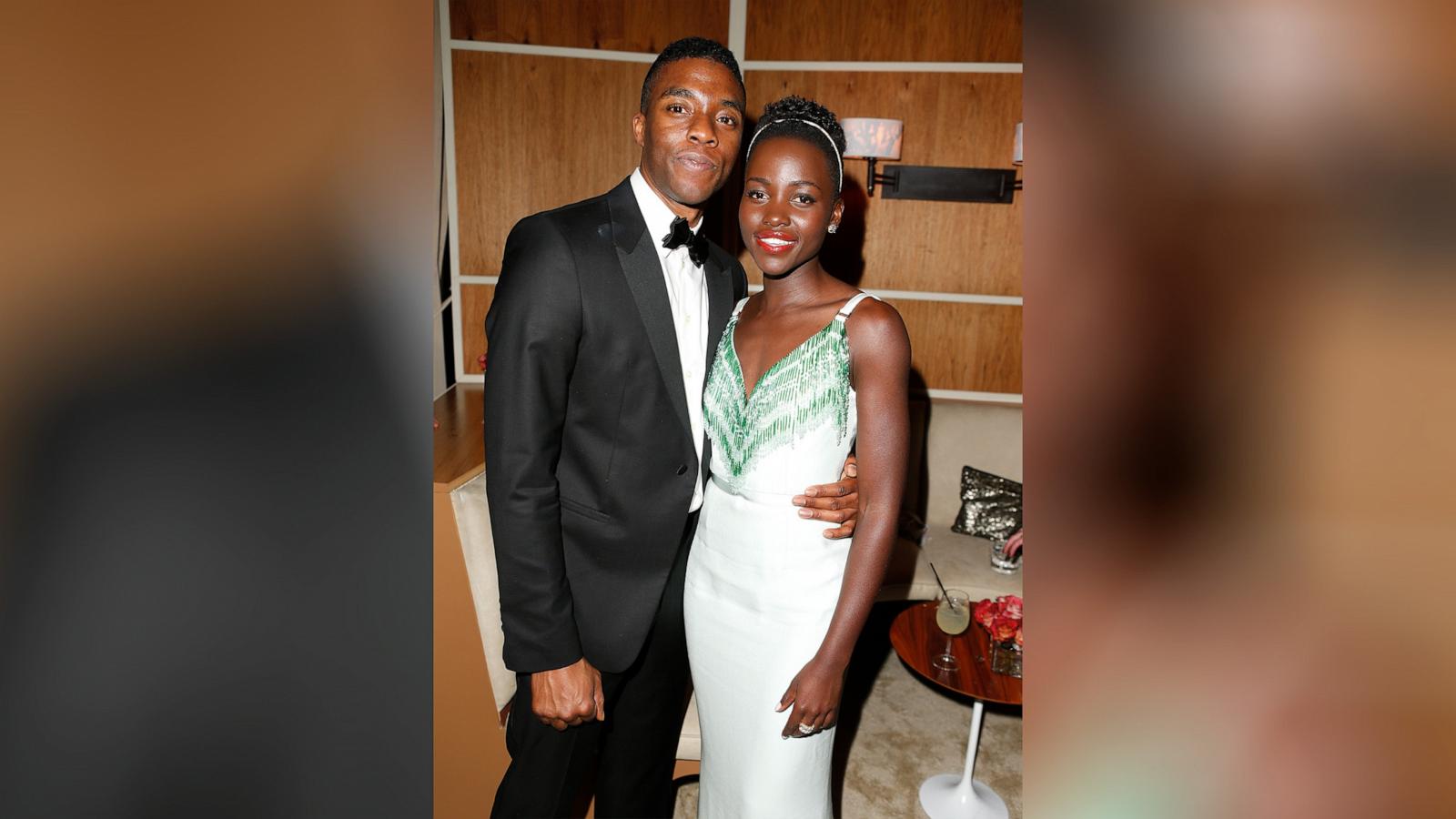 PHOTO: In this March 2, 2014 file photo, Lupita Nyong'o, right, and Chadwick Boseman attend the 2014 Vanity Fair Oscar Party Hosted By Graydon Carter in West Hollywood, Calif.