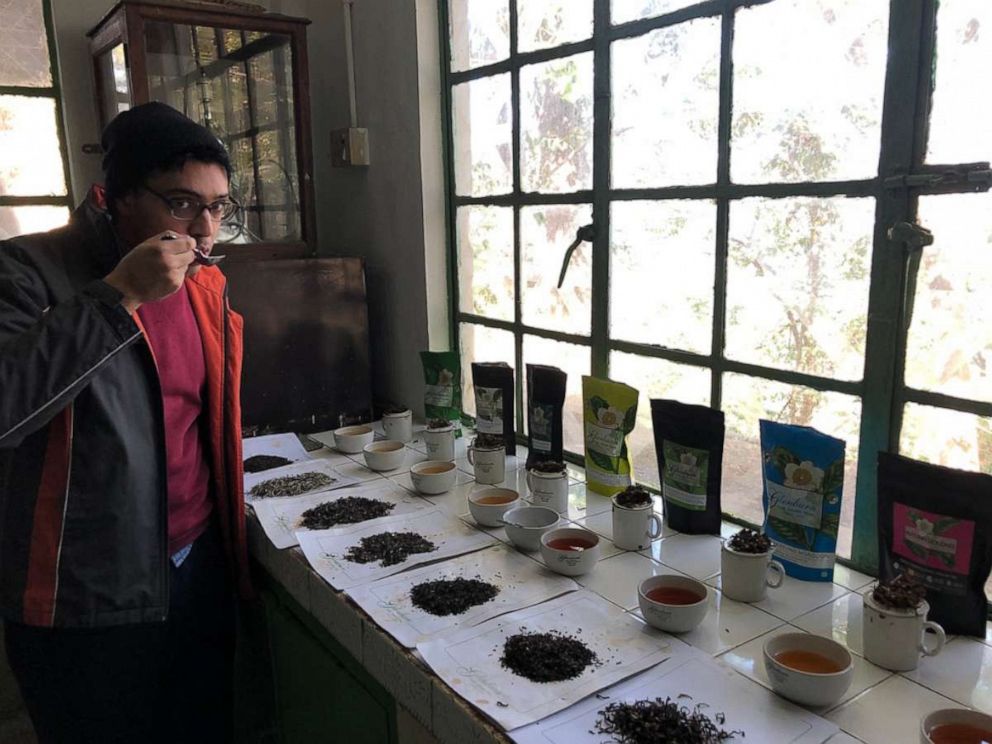 PHOTO: Ayan Sanyal, co-founder of Kolkata Chai Co., in Darjeeling, India learning more about the production of tea leaves.