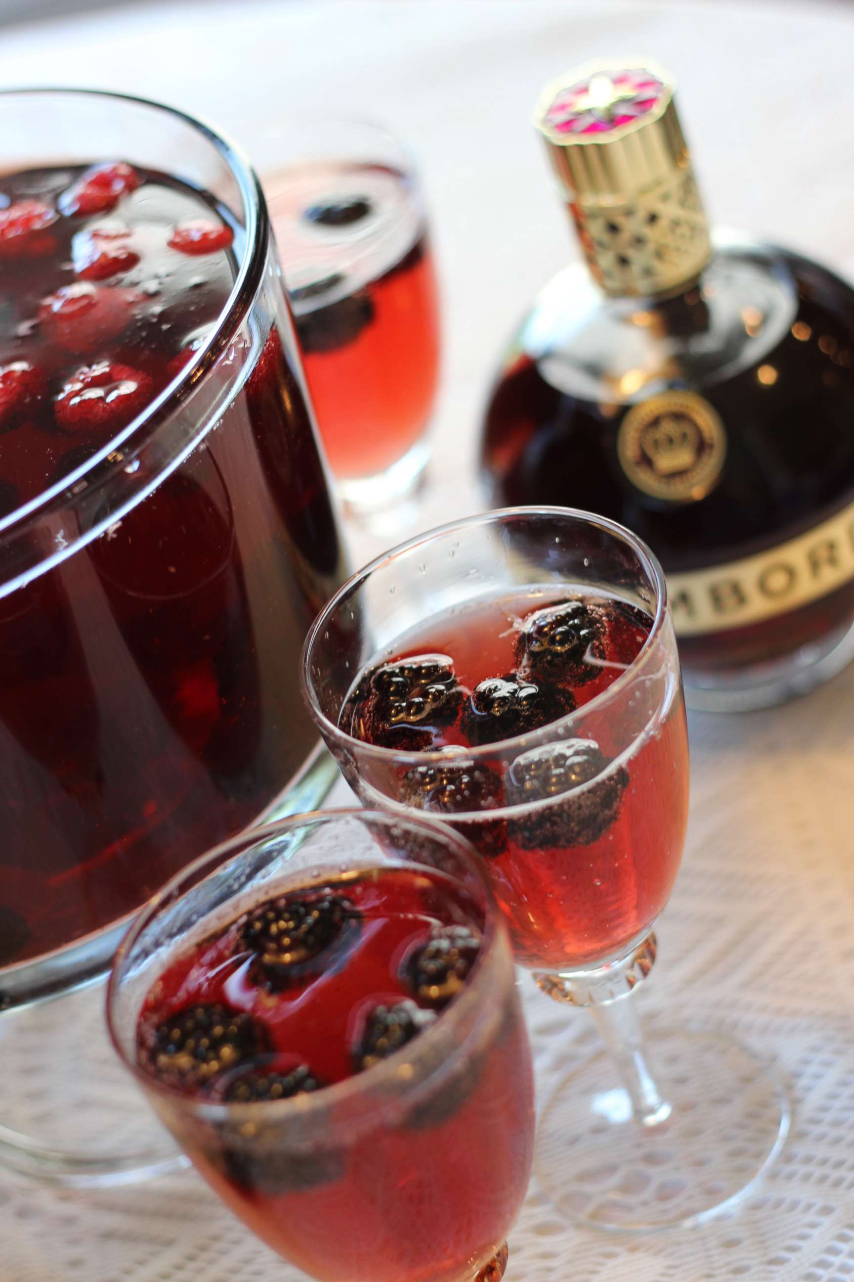 PHOTO: A sparkling Chambord and champagne cocktail with raspberries and blackberries.