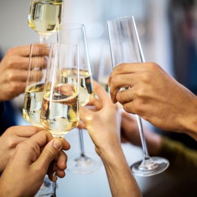 PHOTO: People toast champagne flutes in this undated stock photo.