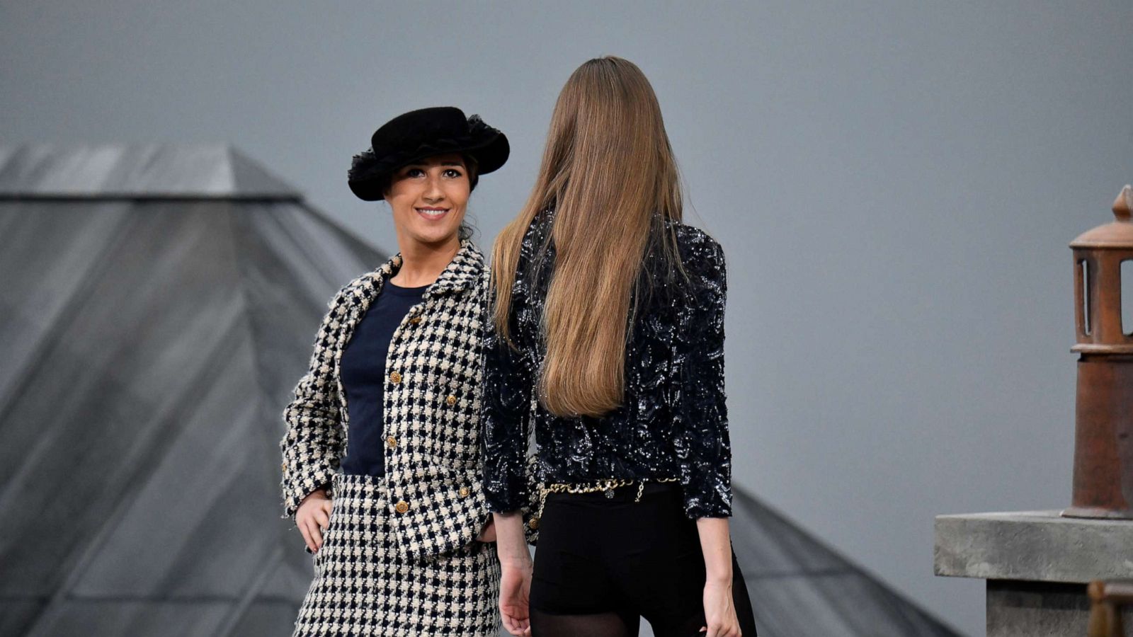 PHOTO: Gigi Hadid approaches the woman during the finale and escorted her off the catwalk, during the Chanel Ready to Wear Spring/Summer 2020 fashion show as part of Paris Fashion Week on October 01, 2019, in Paris.