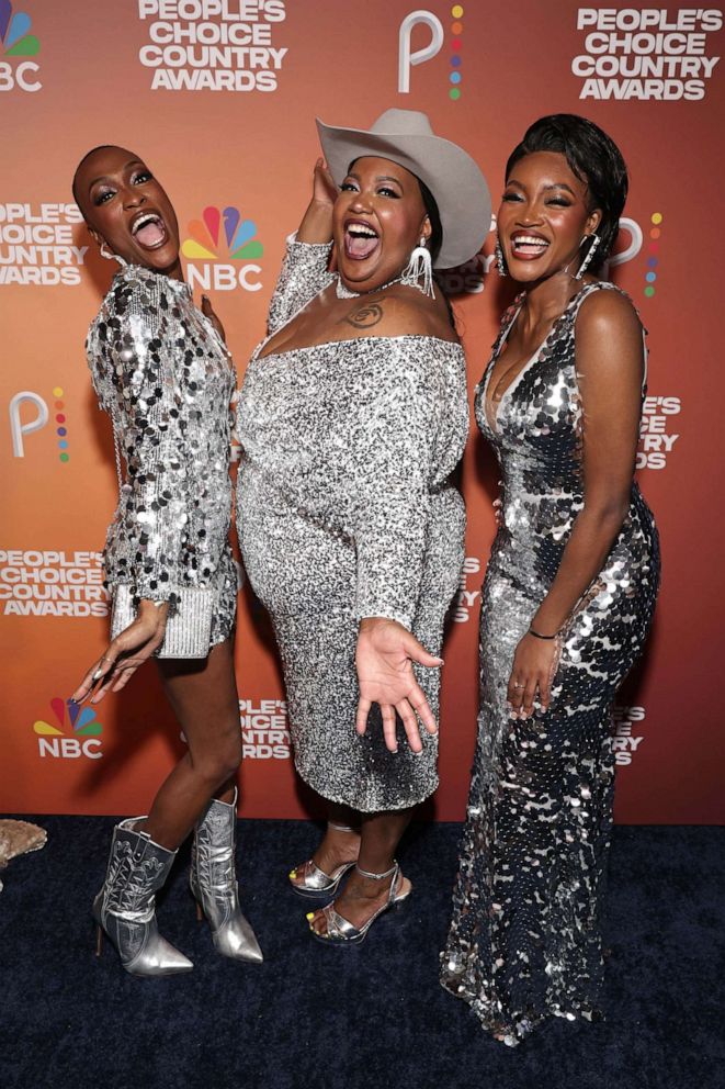 PHOTO: Trea Swindle, Danica Hart, and Devynn Hart of Chapel Hart arrive to the 2023 People's Choice Country Awards held at the Grand Ole Opry House on Sept. 28, 2023, in Nashville, Tenn.