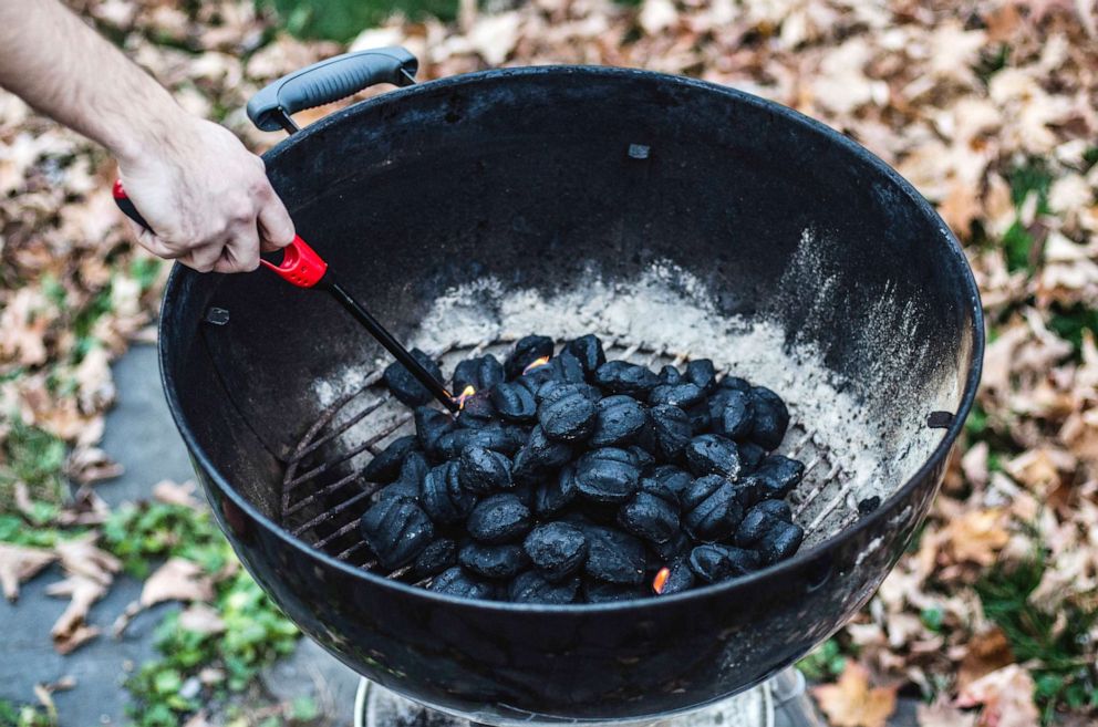 PHOTO: Stock photo of charcoal being prepped for a barbecue.