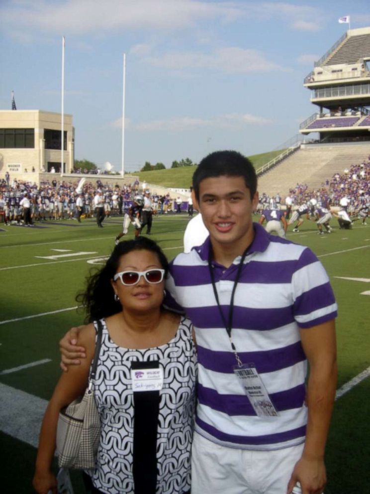 PHOTO: Charles Melton with his mother on recruiting day at Kansas State University.