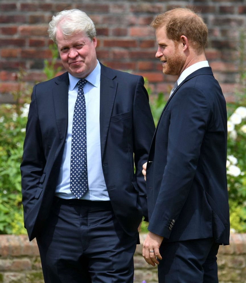PHOTO: Britain's Prince Harry stands with his Uncle, Charles Spencer as he and Prince William unveil a statue they commissioned of their mother Princess Diana in the Sunken Garden at Kensington Palace, London, July 1, 2021.