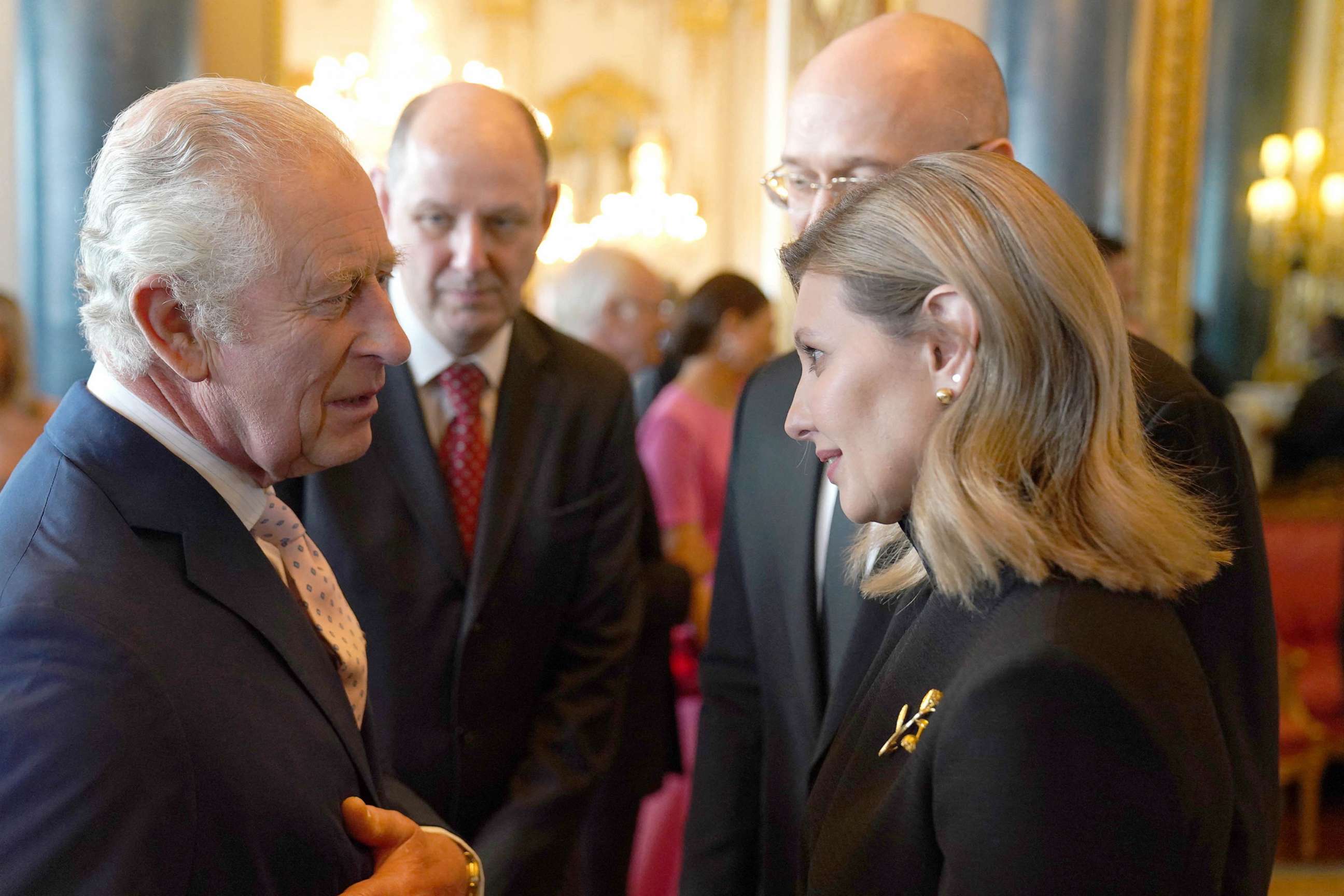 PHOTO: Britain's King Charles III speaks with Ukraine's First Lady Olena Zelenska and Ukraine's Prime Minister Denys Shmyhal during a reception for overseas guests attending his coronation, at Buckingham Palace in central London, May 5, 2023.