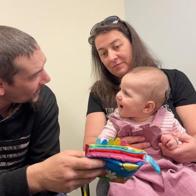 PHOTO: Erin and Tyler Sinclair’s daughter Charlie reacts to hearing for the first time after receiving cochlear implants in January 2024.