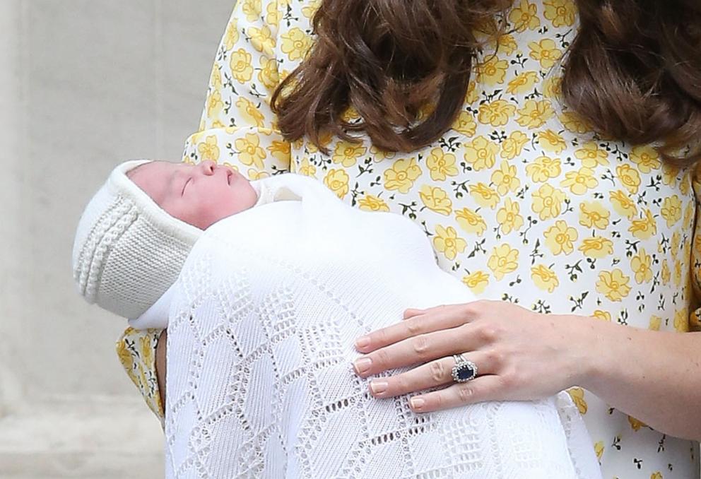 PHOTO: Catherine, Duchess of Cambridge and Prince William, Duke of Cambridge depart the Lindo Wing with their newborn daughter Princess Charlotte at St Mary's Hospital, May 2, 2015, in London.