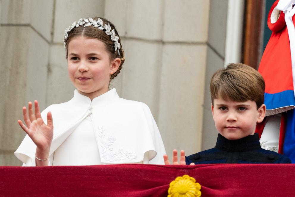 PHOTO: Princess Charlotte of Wales and Prince Louis of Wales on the balcony of Buckingham Palace following the Coronation of King Charles III and Queen Camilla, May 6, 2023, in London.
