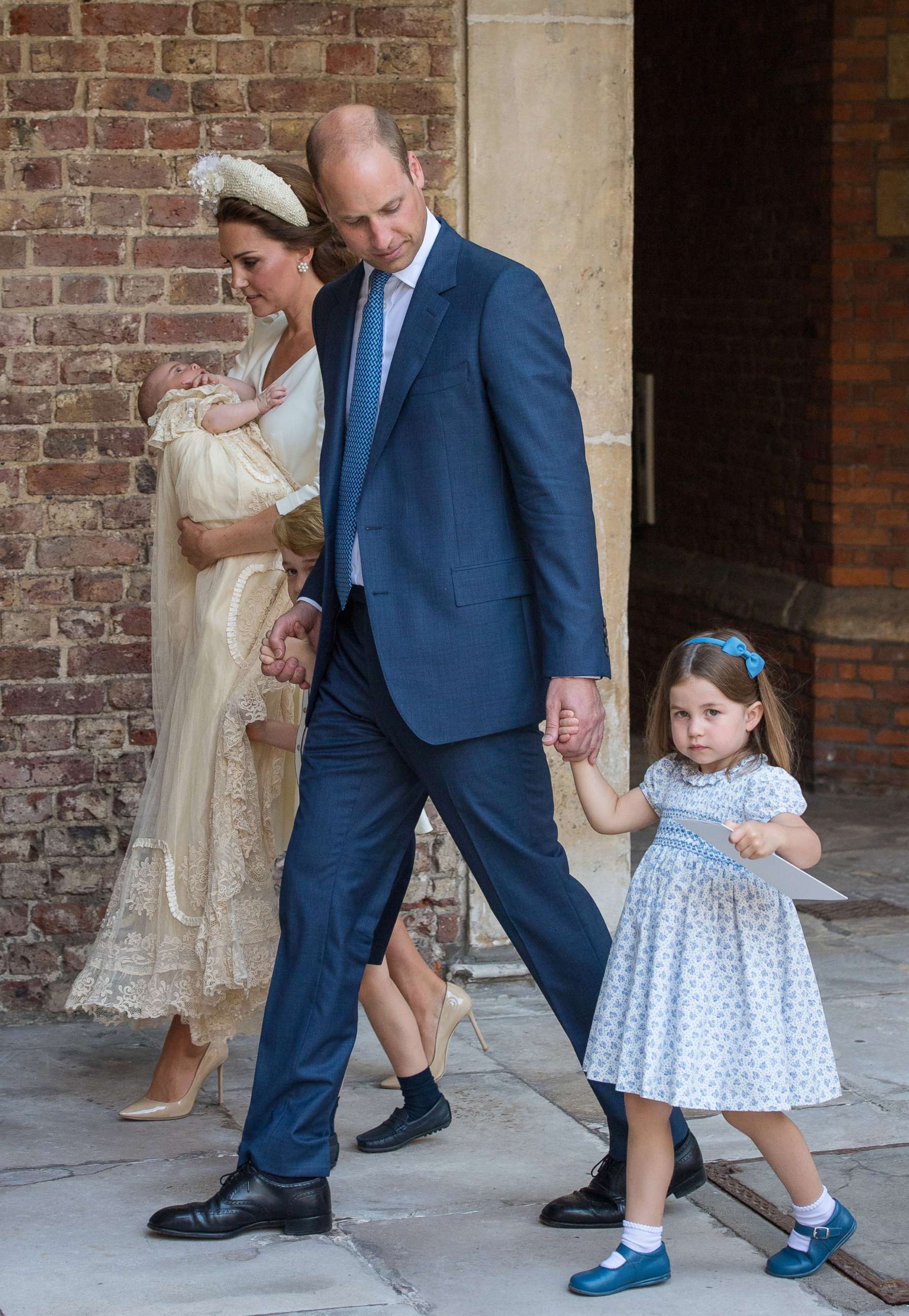 PHOTO: Prince William, Duke of Cambridge and Catherine, Duchess of Cambridge with their children Prince George, Princess Charlotte and Prince Louis leave after Prince Louis' christening at St. James's Palace in London, July 9, 2018.