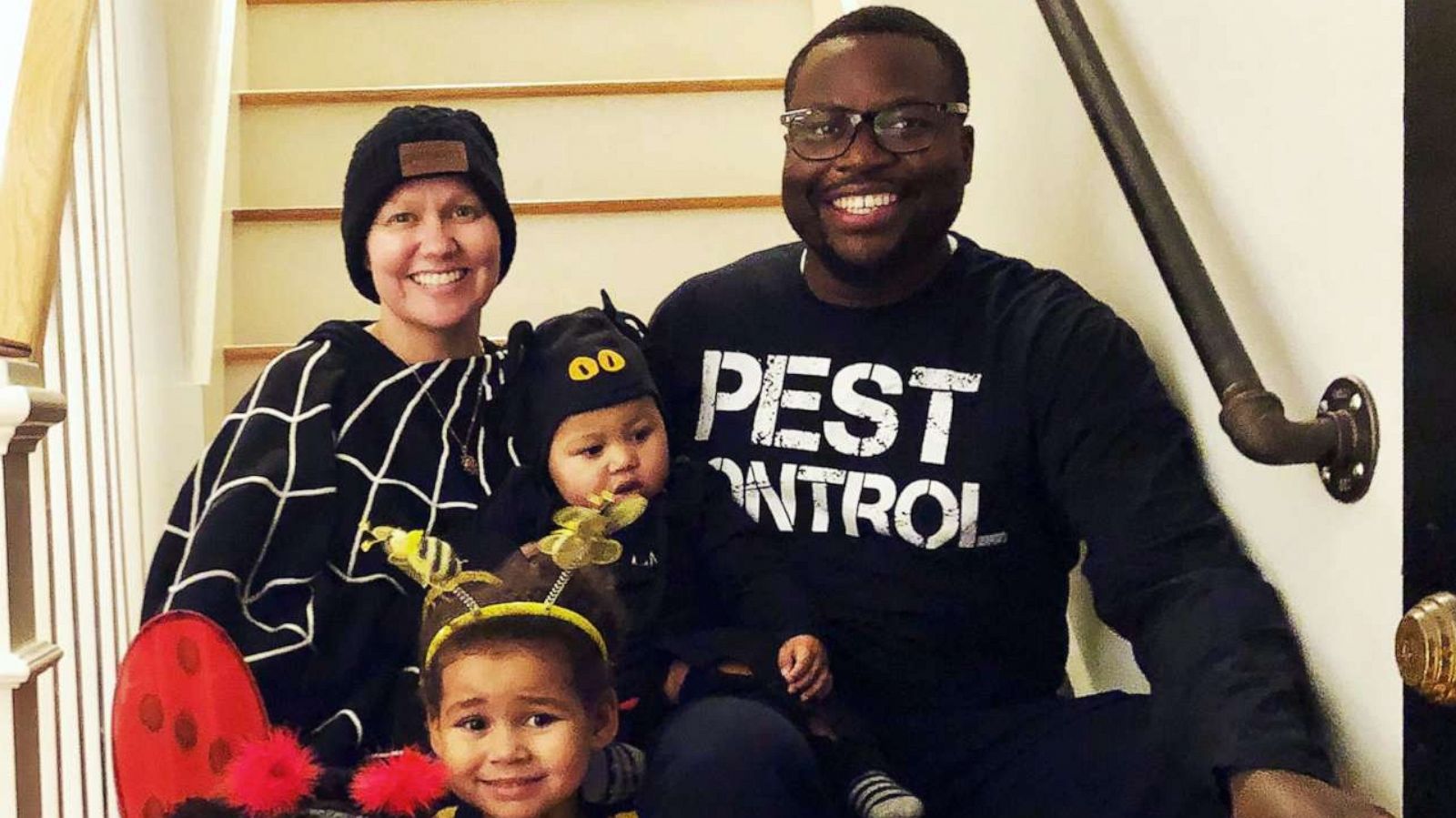 PHOTO: Charlotte Ngarukiye poses for a photo with her husband and their three children in October 2019.