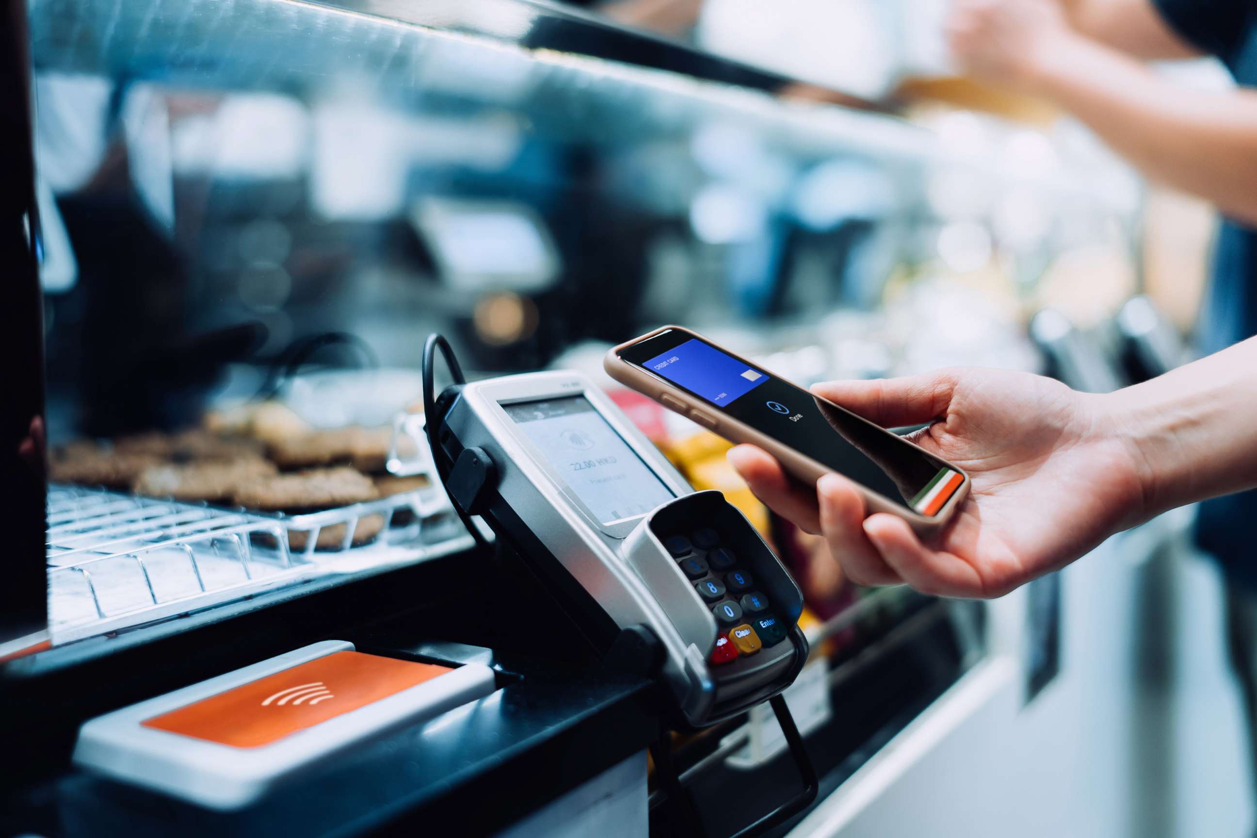 PHOTO: Stock photo of a person for food with their phone.