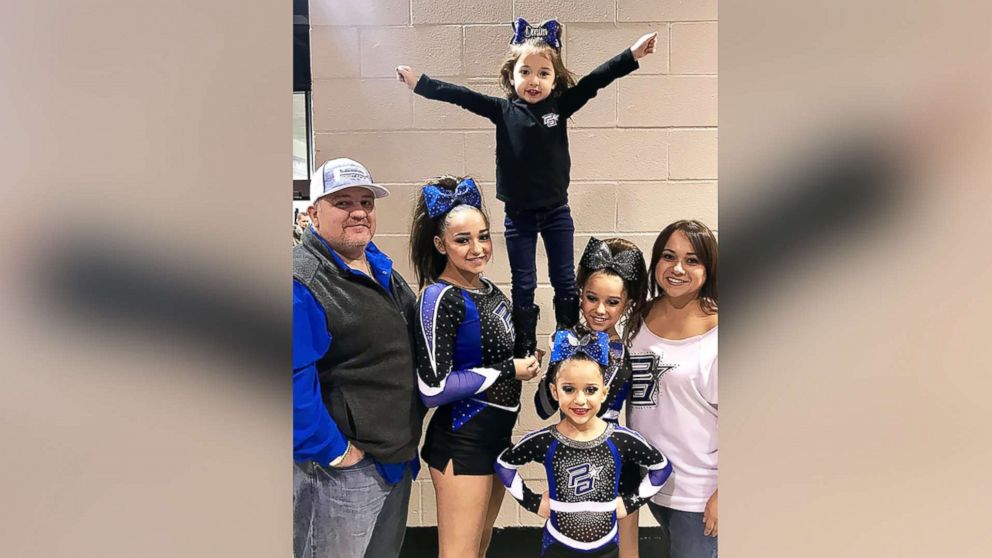 PHOTO: Kynzee Bryan, 4, poses in a cheerleading stunt with her sisters, Kellee, 6, Kendall, 11 and Kaytlynn, 15 and her parents Gina and Gregory Bryan of Katy, Texas.