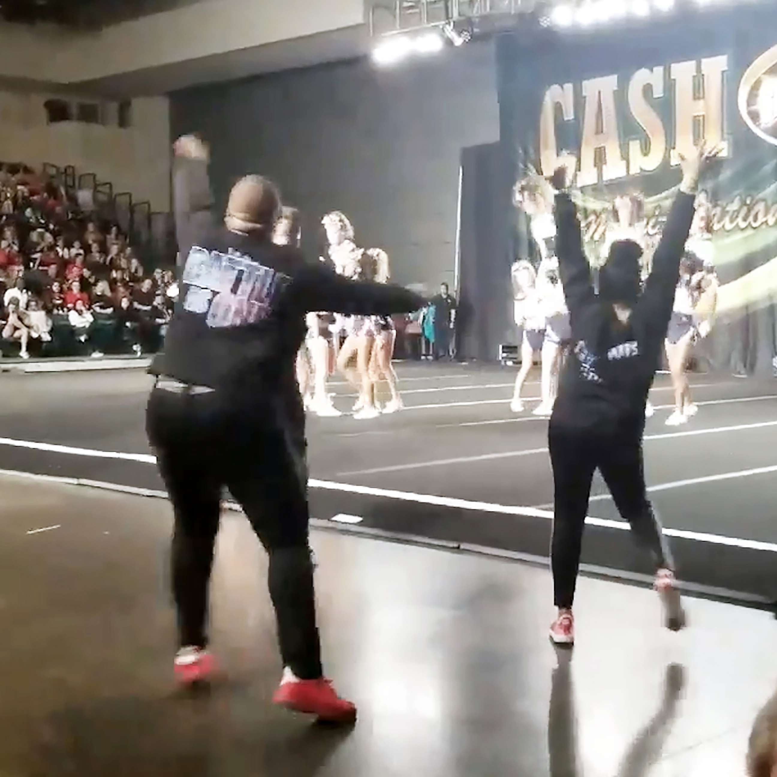 PHOTO: Trey McGhee and Kymberli Browder of All-Star Revolution gym in Texas, were captured on video by a parents while cheering on their team on Jan. 12, at a cheerleading competition.