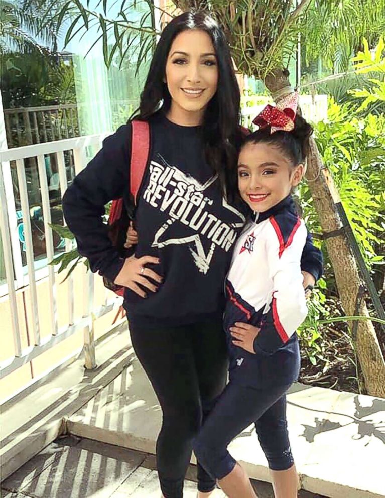 PHOTO: Brigitte Ramirez poses with her daughter, Briana Silva, on Jan. 11, which was day one of the American Cheer Power cheerleading competition in Galveston, Texas.