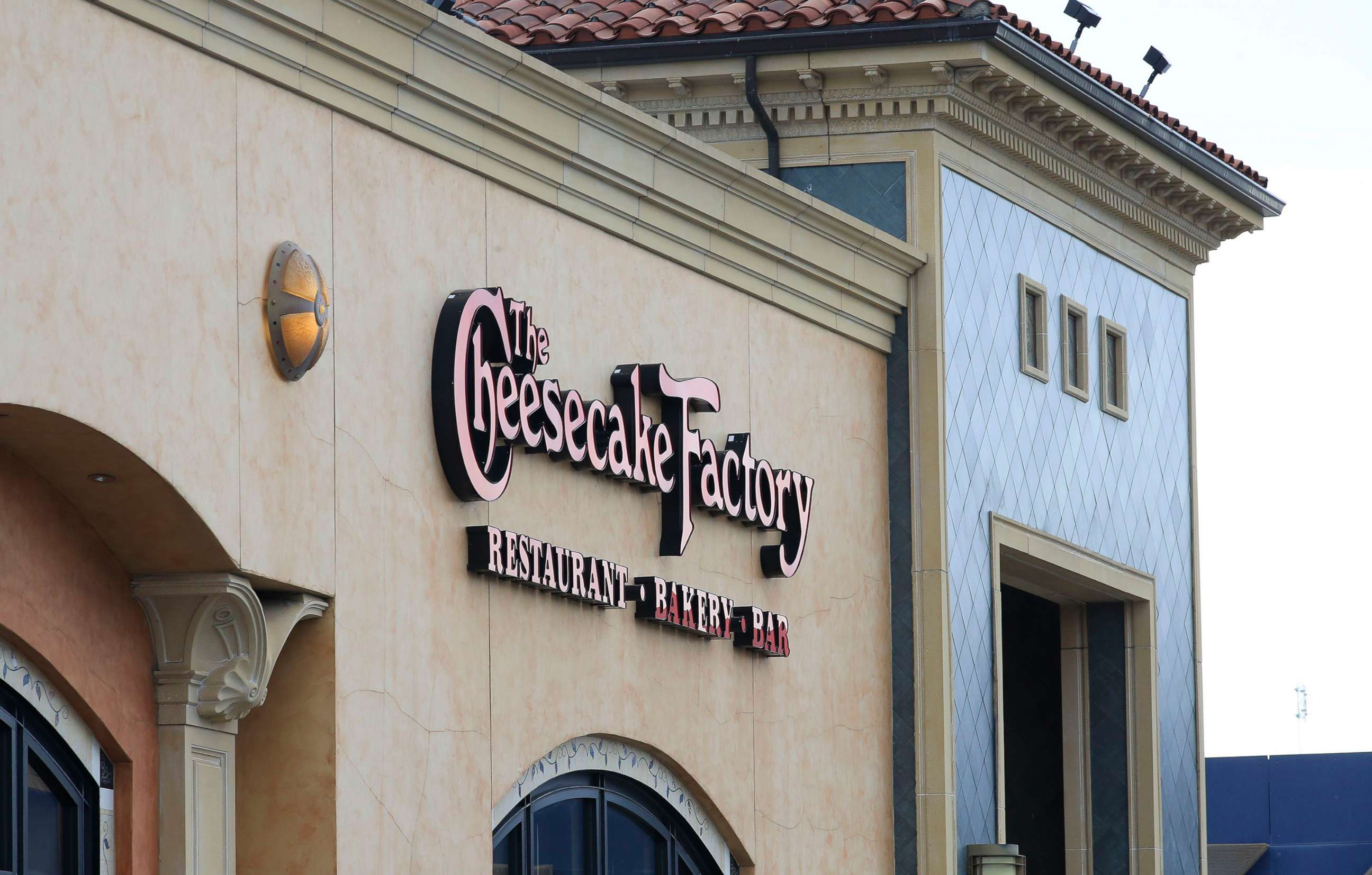 PHOTO: In this March 26, 2020, file photo, a Cheesecake Factory restaurant is shown in Louisville, Ky.