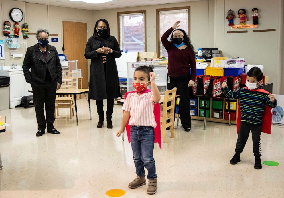 PHOTO: Mayor Lori Lightfoot, left, and Chicago Public Schools CEO Janice Jackson, second from left, visit a preschool classroom at Dawes Elementary School in Chicago, Jan. 11, 2021. 