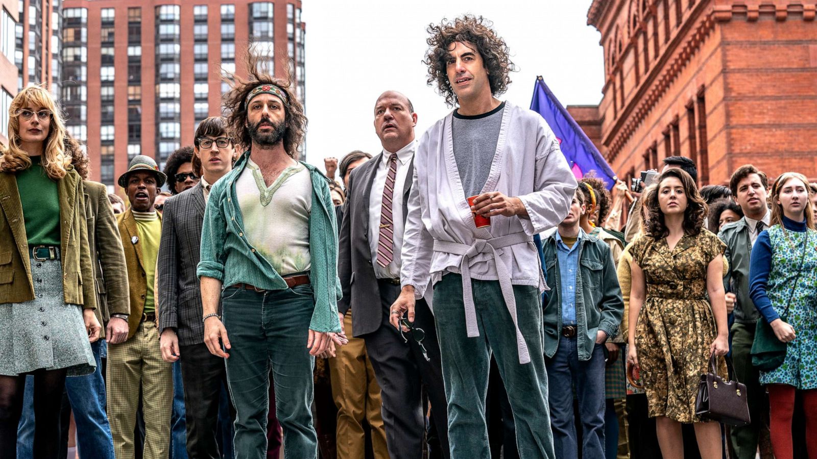 PHOTO: From left, Caitlin Fitzgerald, Jeremy Strong and Sasha Baron Cohen in a scene from "The Trial of the Chicago 7."