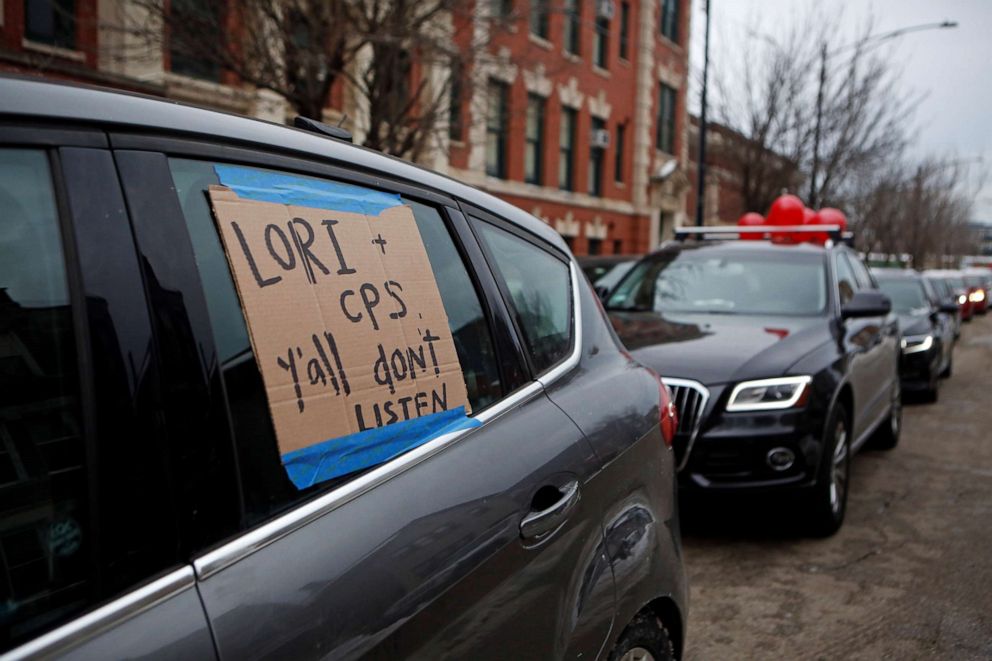 PHOTO: Supporters of the Chicago Teachers Union participate in a car caravan as negotiations with Chicago Public Schools continue over a COVID-19 safety plan agreement in Chicago, Jan. 30, 2021.