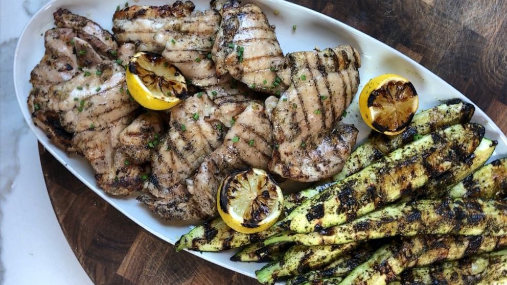 PHOTO: Grilled chicken and zucchini with za'atar spice and charred lemons. 