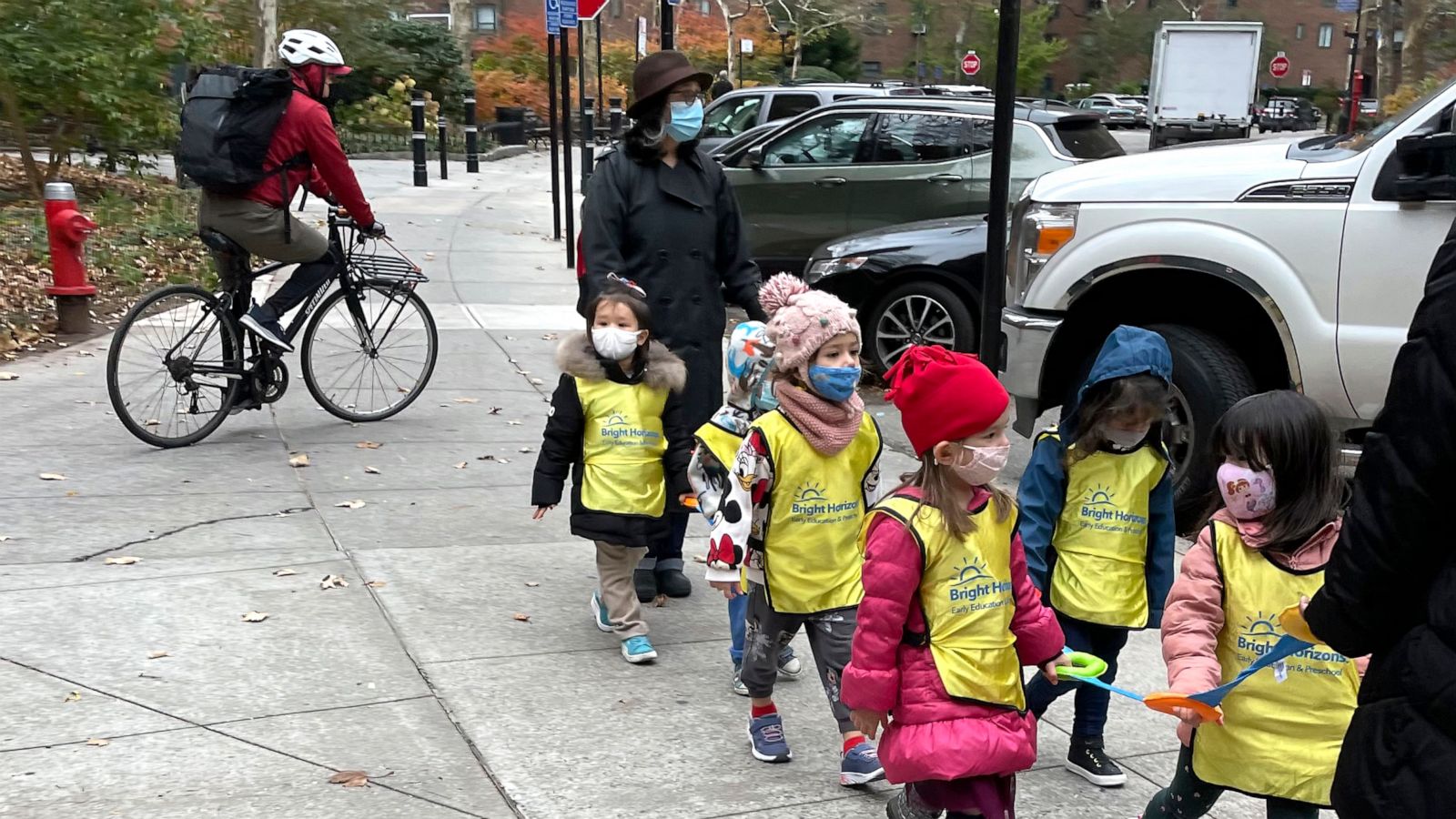 PHOTO: In this Nov. 22, 2021, file photo, school children wear masks while out for a walk in New York.