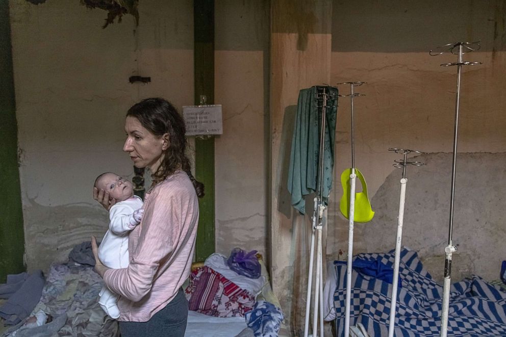 PHOTO: Kateryna holds her five-month-old premature baby, Diana, in the basement of the children's hospital which is also serving as a bomb shelter in Kyiv, Ukraine, March 1, 2022.