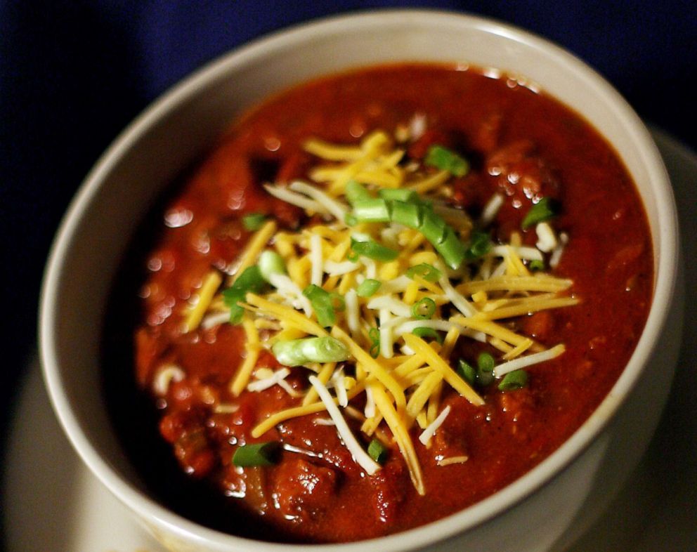 PHOTO: Chili garnished with cheese and scallions.