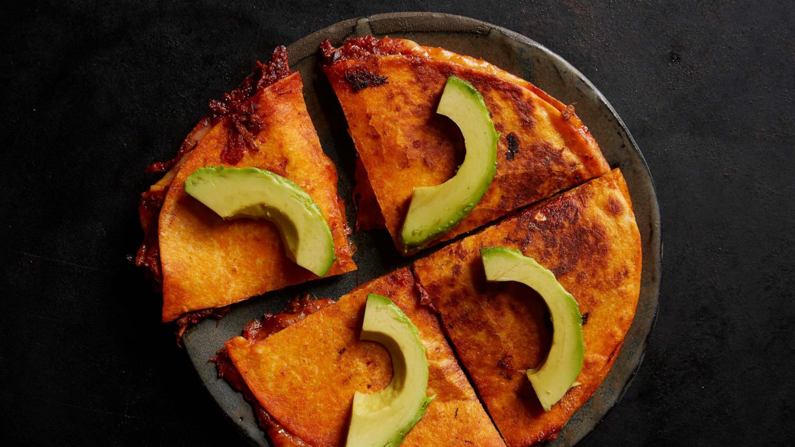 PHOTO: Chilorio quesadilla topped with avocado.