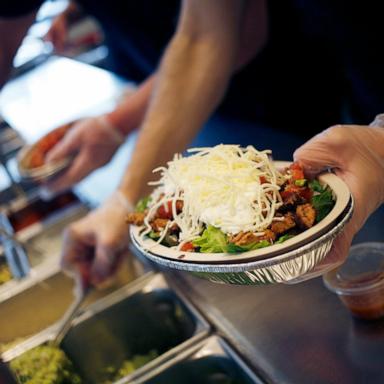 PHOTO: In this Feb. 2, 2019, file photo, an employee prepares a burrito bowl at a Chipotle Mexican Grill Inc. restaurant in Louisville, Kentucky.