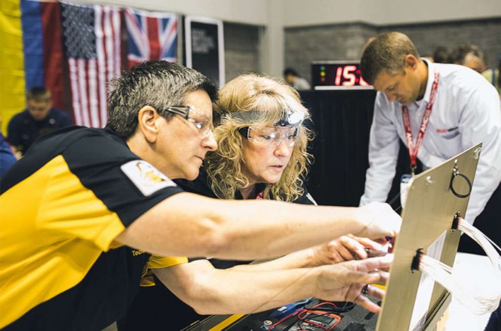 PHOTO: Joanne Mulherin and Polly Delaney competing at the 2018 Aerospace Maintenance Competition for United Airline's all-female team, Chix Fix.