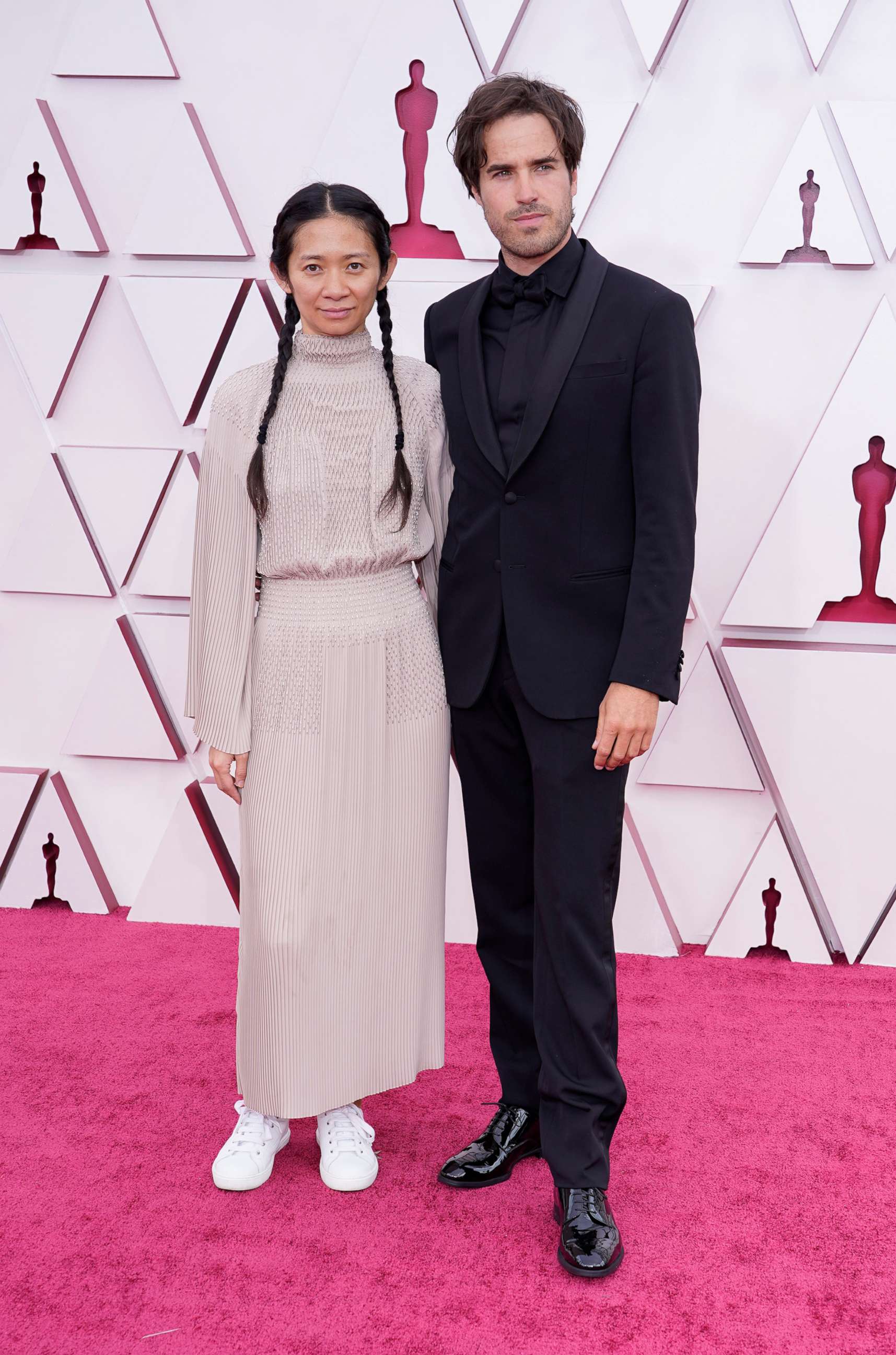 PHOTO: Chloe Zhao and Joshua James Richards arrive to the 93rd Academy Awards, at Union Station, in Los Angeles, April 25, 2021.