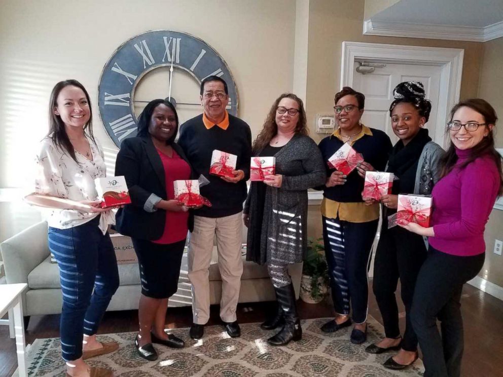 PHOTO: Dedra Moon partnered with volunteers at the Samaritan House shelter to help distribute Valentine's chocolates to survivors of domestic violence. 