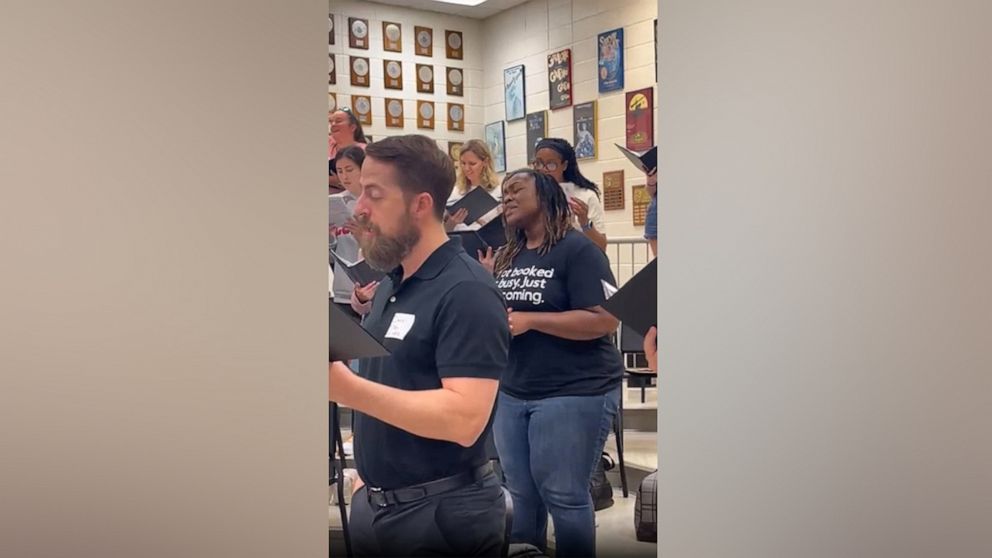 PHOTO: A video clip of chorus teacher Jim Stanley's former students rehearsing for an alumni concert has gone viral.