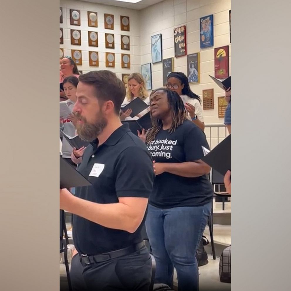 VIDEO: Former students return to high school to sing with retiring chorus teacher 