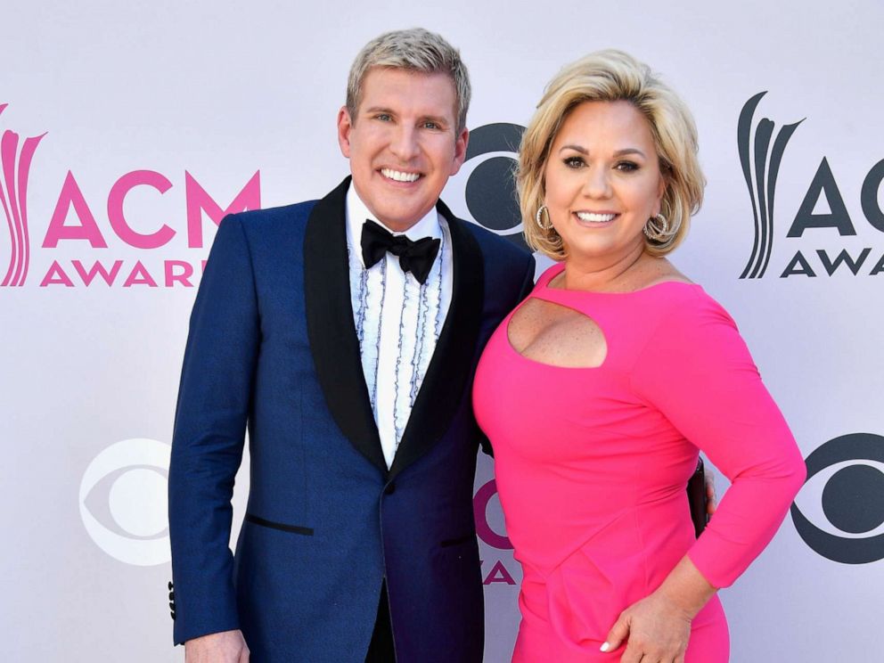 PHOTO: TV personalities Todd Chrisley and Julie Chrisley attend the 52nd Academy Of Country Music Awards at Toshiba Plaza on April 2, 2017 in Las Vegas, Nevada.