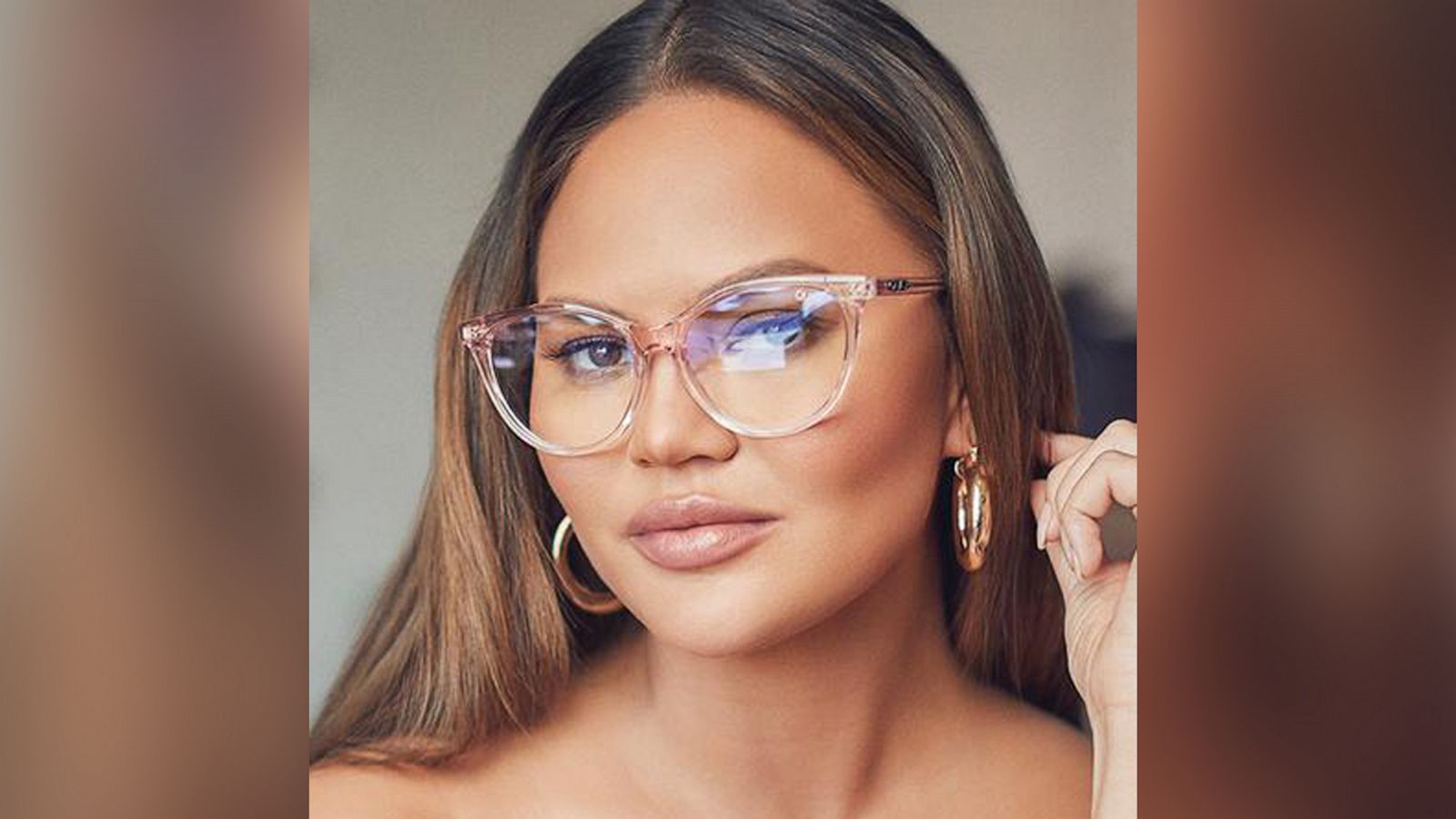 PHOTO: Chrissy Teigen is seen in Quay glasses.