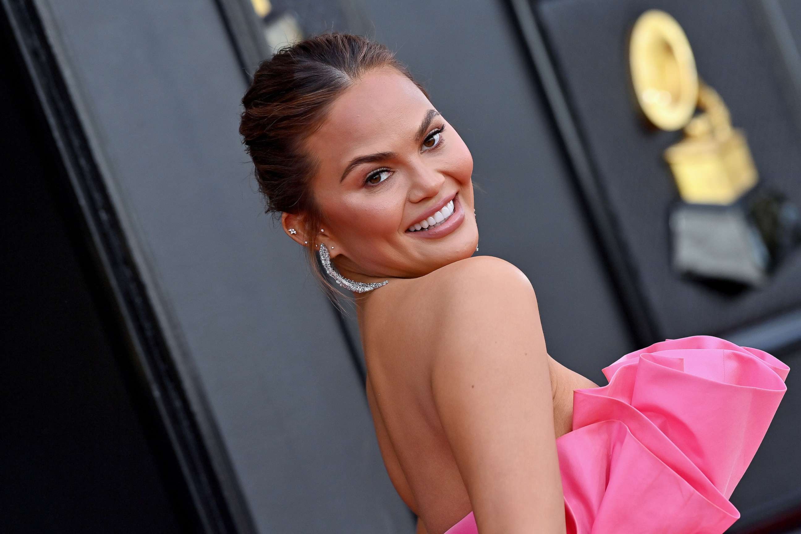 Chrissy Teigen announces she is pregnant: 'We have another on the way' -  ABC News