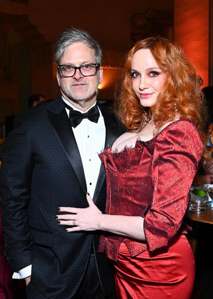 PHOTO: George Bianchini and Christina Hendricks attend The Art of Elysium's 25th Anniversary HEAVEN Gala at The Wiltern on January 06, 2024 in Los Angeles, California.